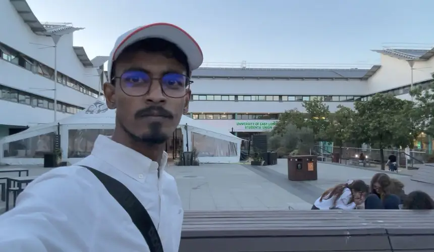 Vasu outside another campus building.